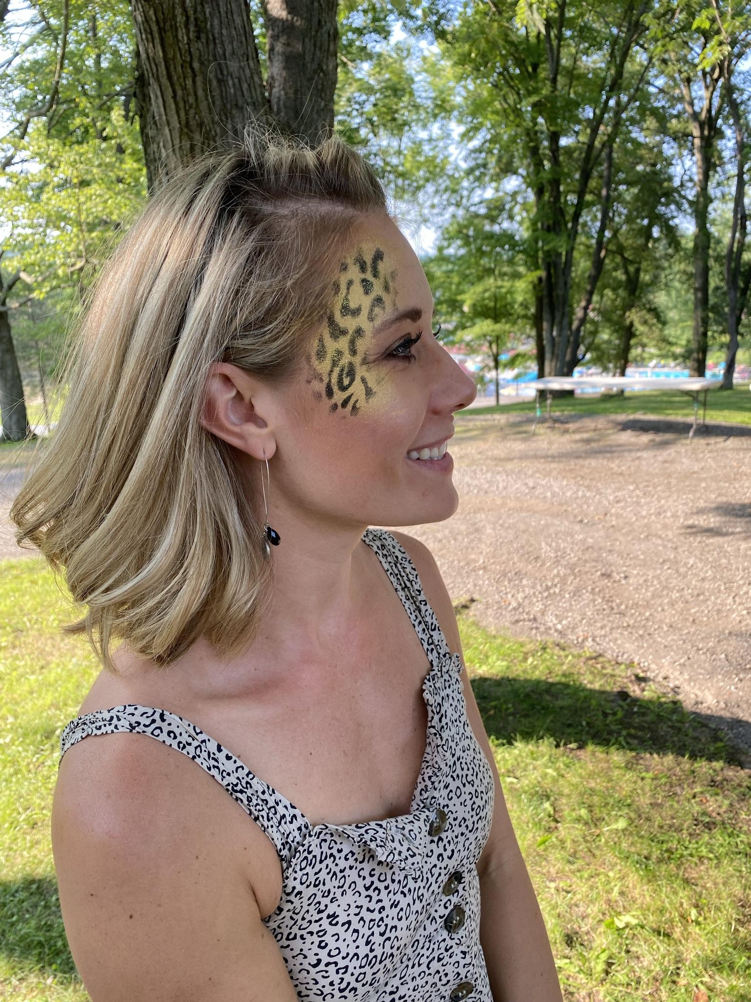 Chita like design on the side of a women's face